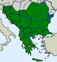 rozšíření užovky podplamaté Natrix tessellata  na Balkáně (zeleně)